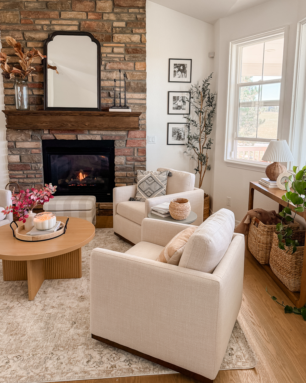 Cozy front sitting room. Family room with stone fireplace. Traditional decor.