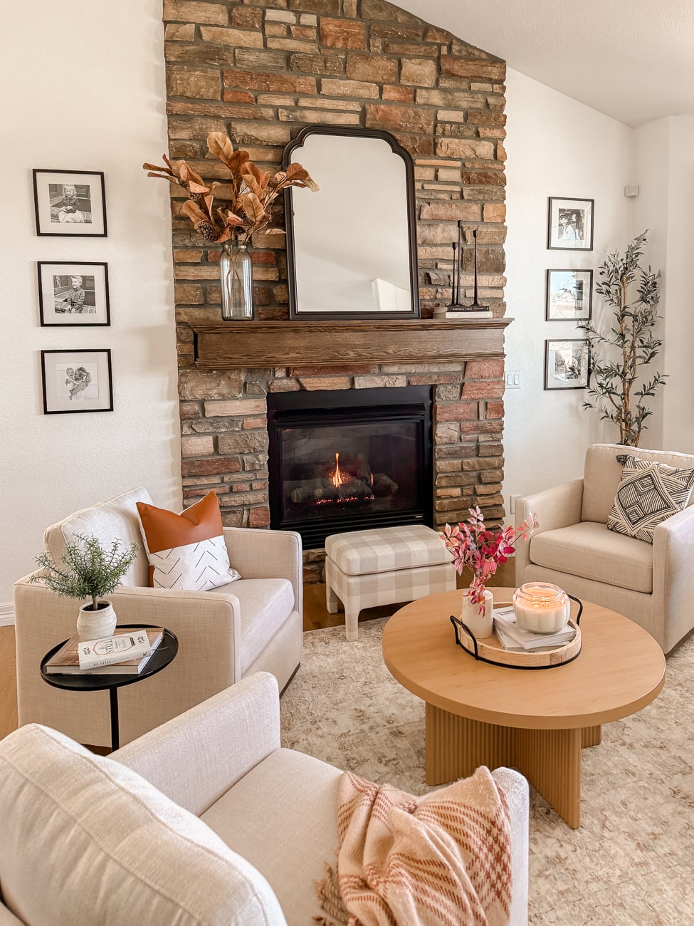 Cozy front sitting room. Family room with stone fireplace. Traditional decor.