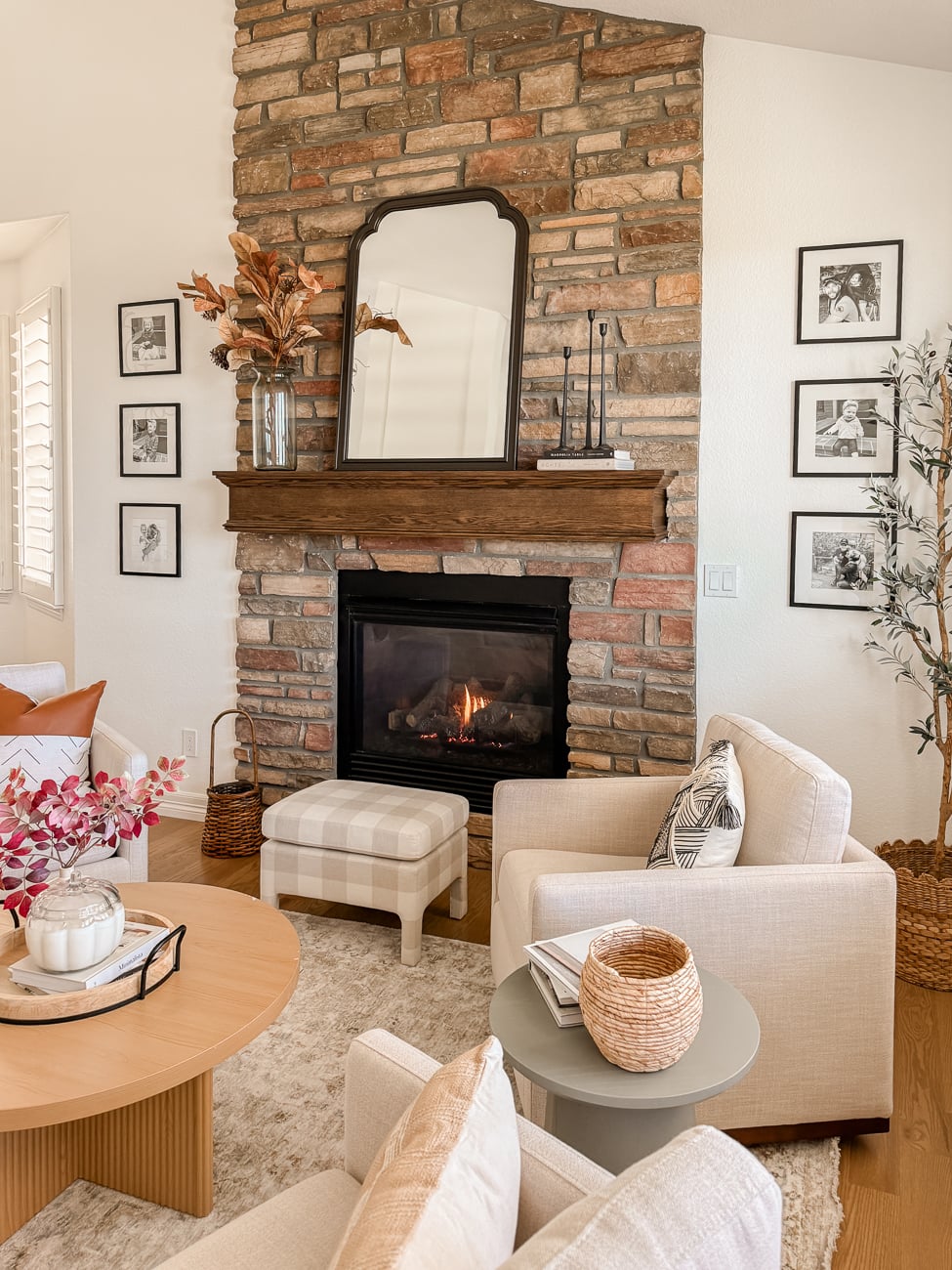 Cozy front sitting room. Family room with stone fireplace. Traditional decor.