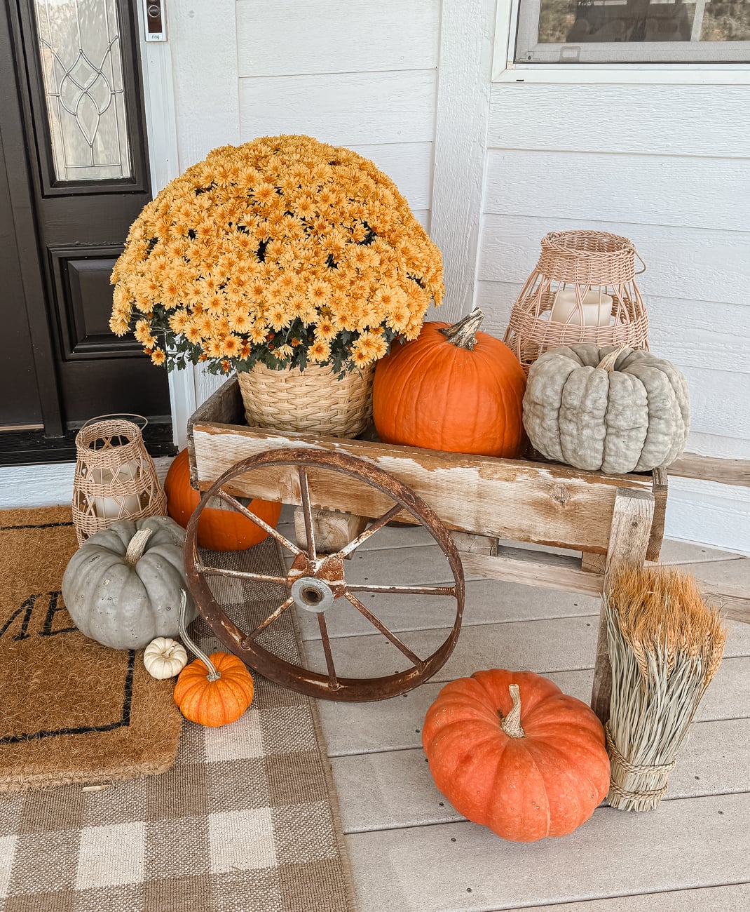Fall Front Porch with Wagon. Fall porch idea with pumpkins and old wagon! Farmhouse porch idea.