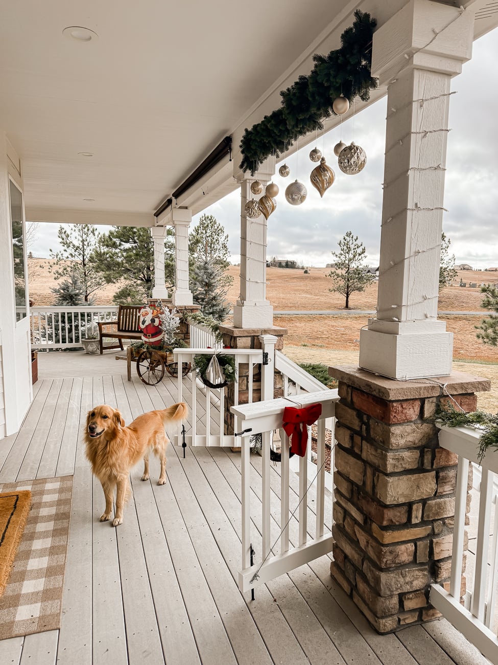Cozy Farmhouse Christmas Porch. Modern farmhouse porch decorated for Christmas.